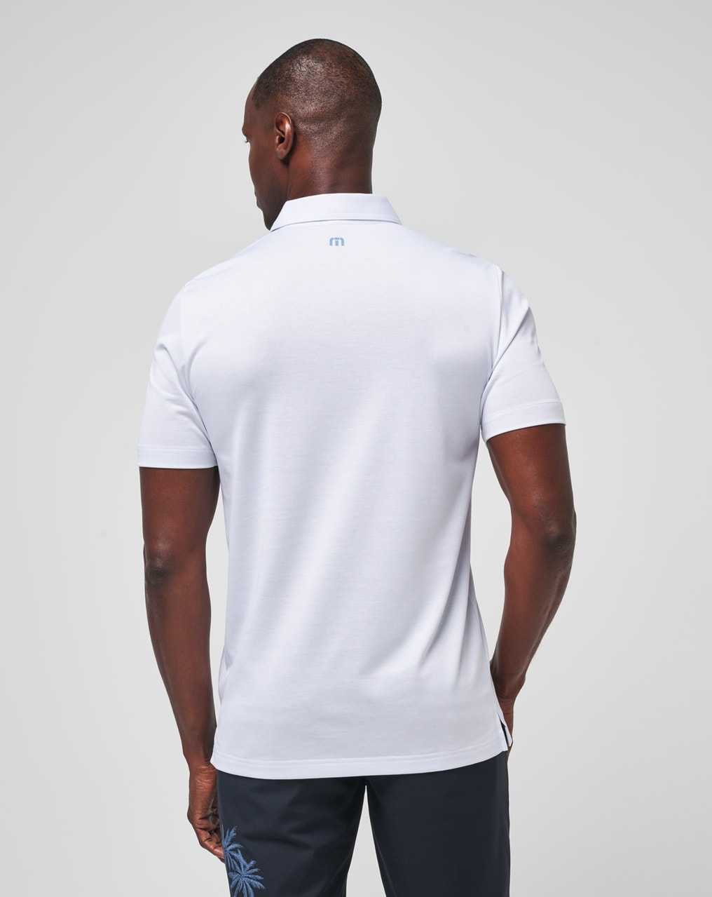 Travis Mathew Dolphin Cruise Polo White | TEUMCIV-16