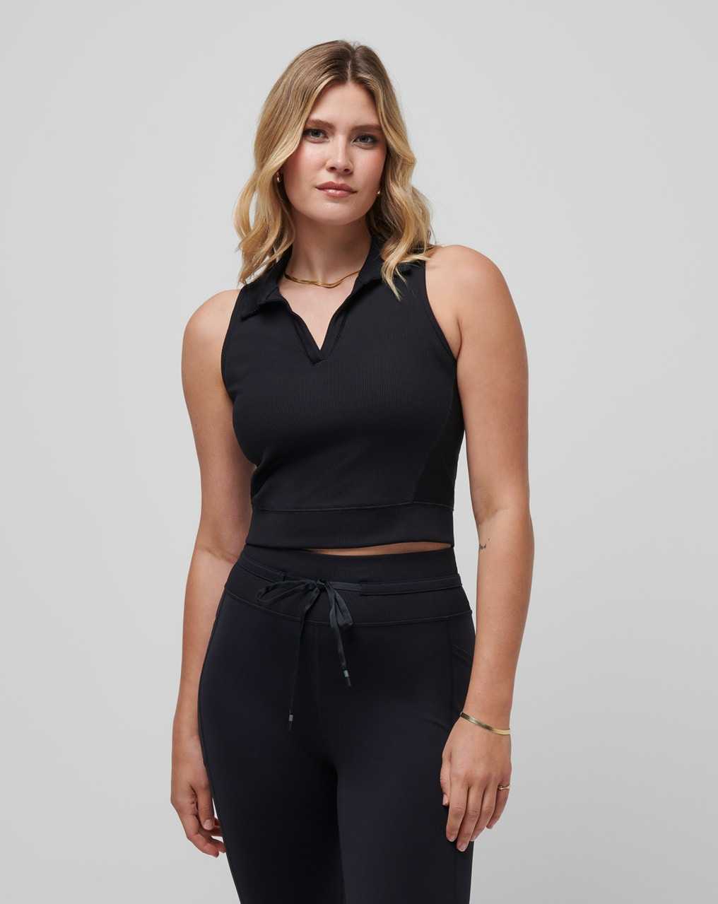 Travis Mathew Moveknit Sleeveless Vneck Polo Black | XEKAQUT-50