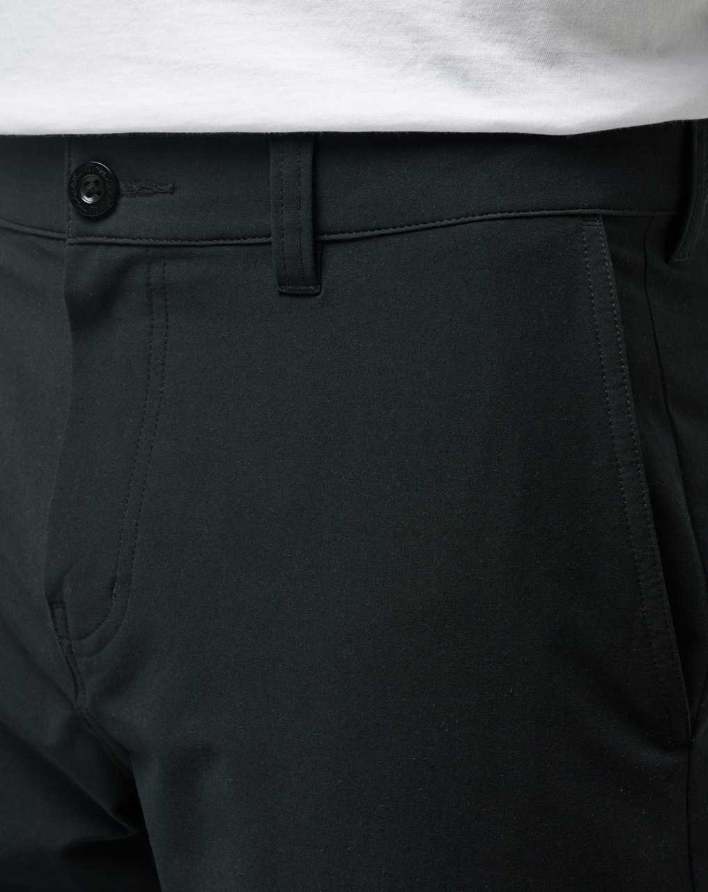 Travis Mathew Tech Chino Short 8in Black | MODTVSI-43