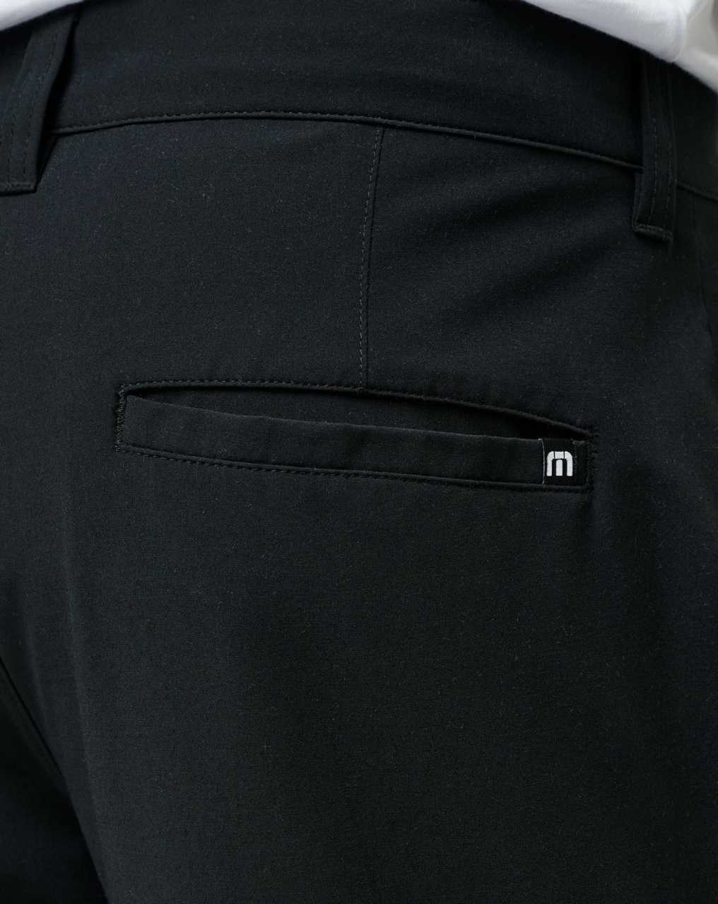 Travis Mathew Tech Chino Short 8in Black | MODTVSI-43